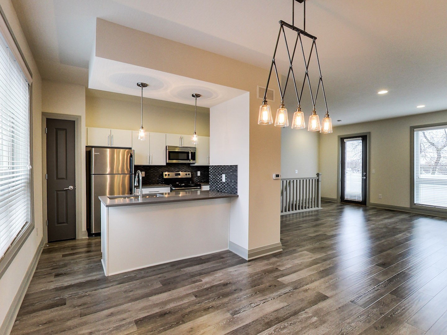 40 West Apartments Columbus Ohio | Short North Rentals | Penthouse 2 Bedroom Kitchen and Living Area