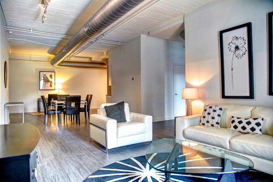 222 Saratoga Apartments | Loft Style Apartments in Baltimore, MD | Living Room Model Apartment