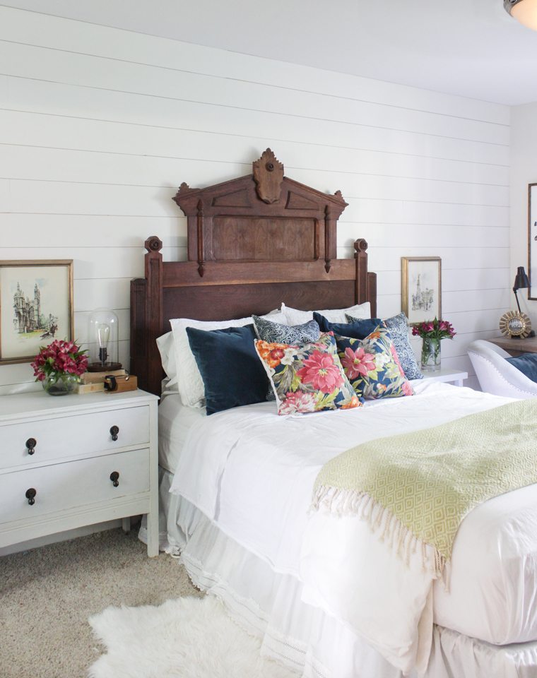 Big, Bold Floral Decor | Design Inspiration | Blue and White Bedroom With Floral Pillows